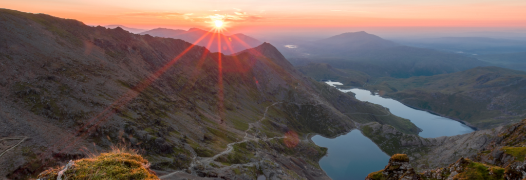 mountain with two lakes and a beautiful sunset.